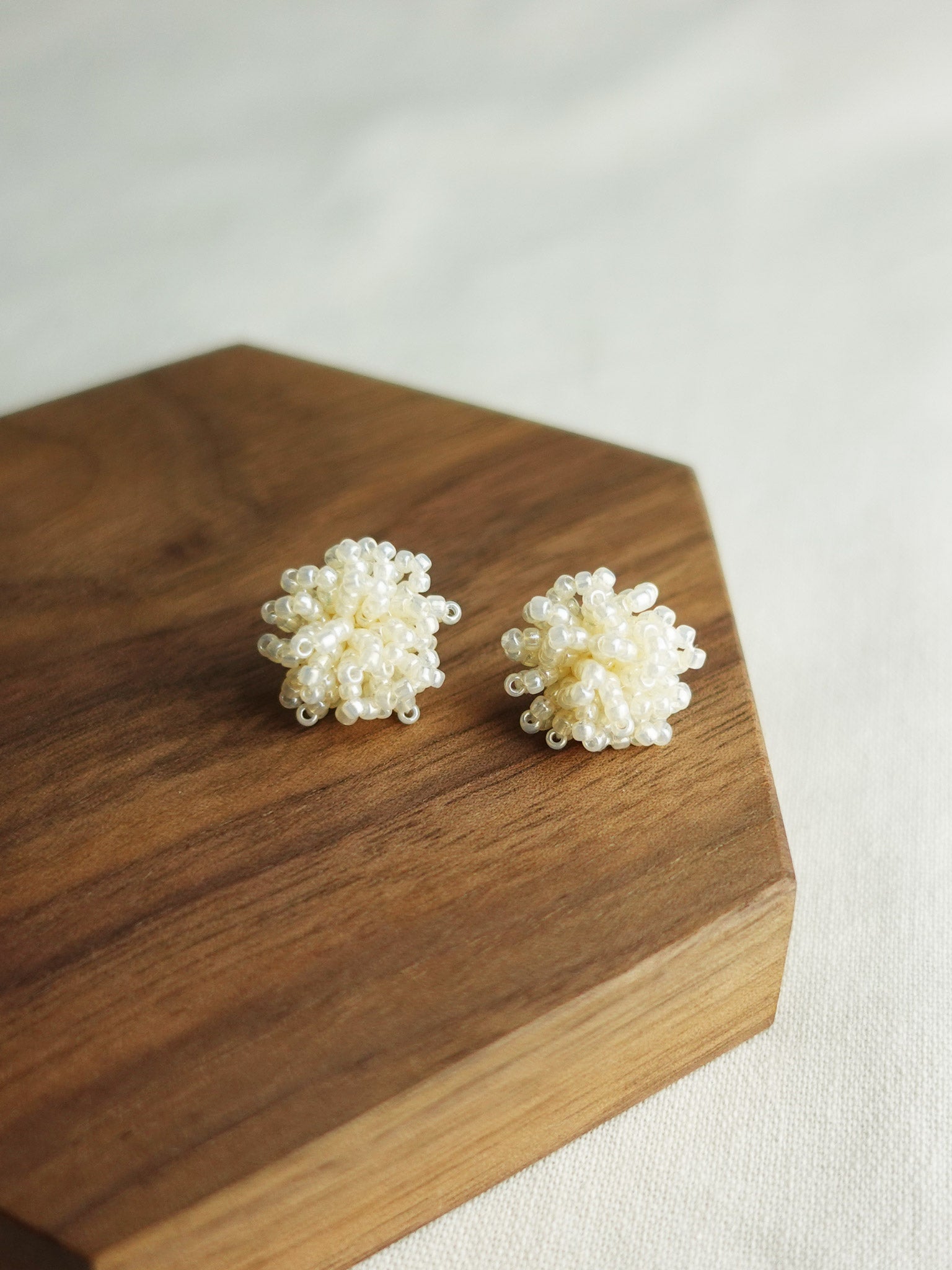 Fluffy Earrings in Ivory Display