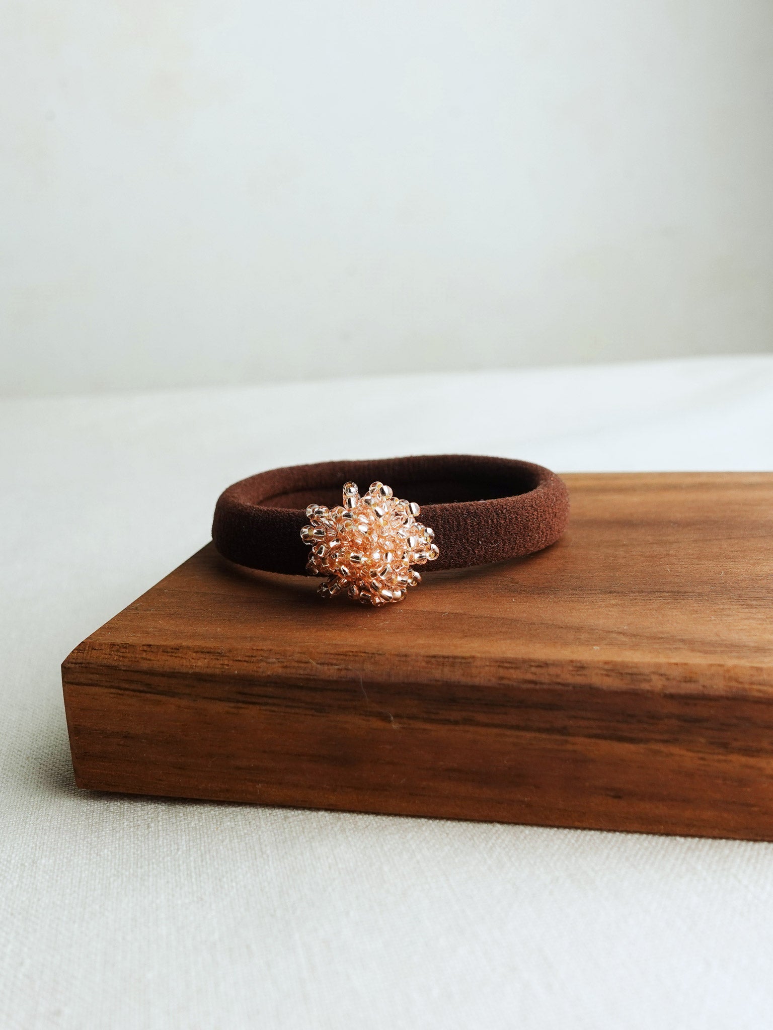 Fluffy Hair Tie in Champagne Pink Display Front