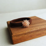 Fluffy Hair Tie in Champagne Pink Display Left