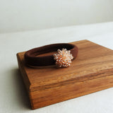 Fluffy Hair Tie in Champagne Pink Display Left
