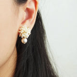 Fluffy Mariota Earrings in Ivory Model