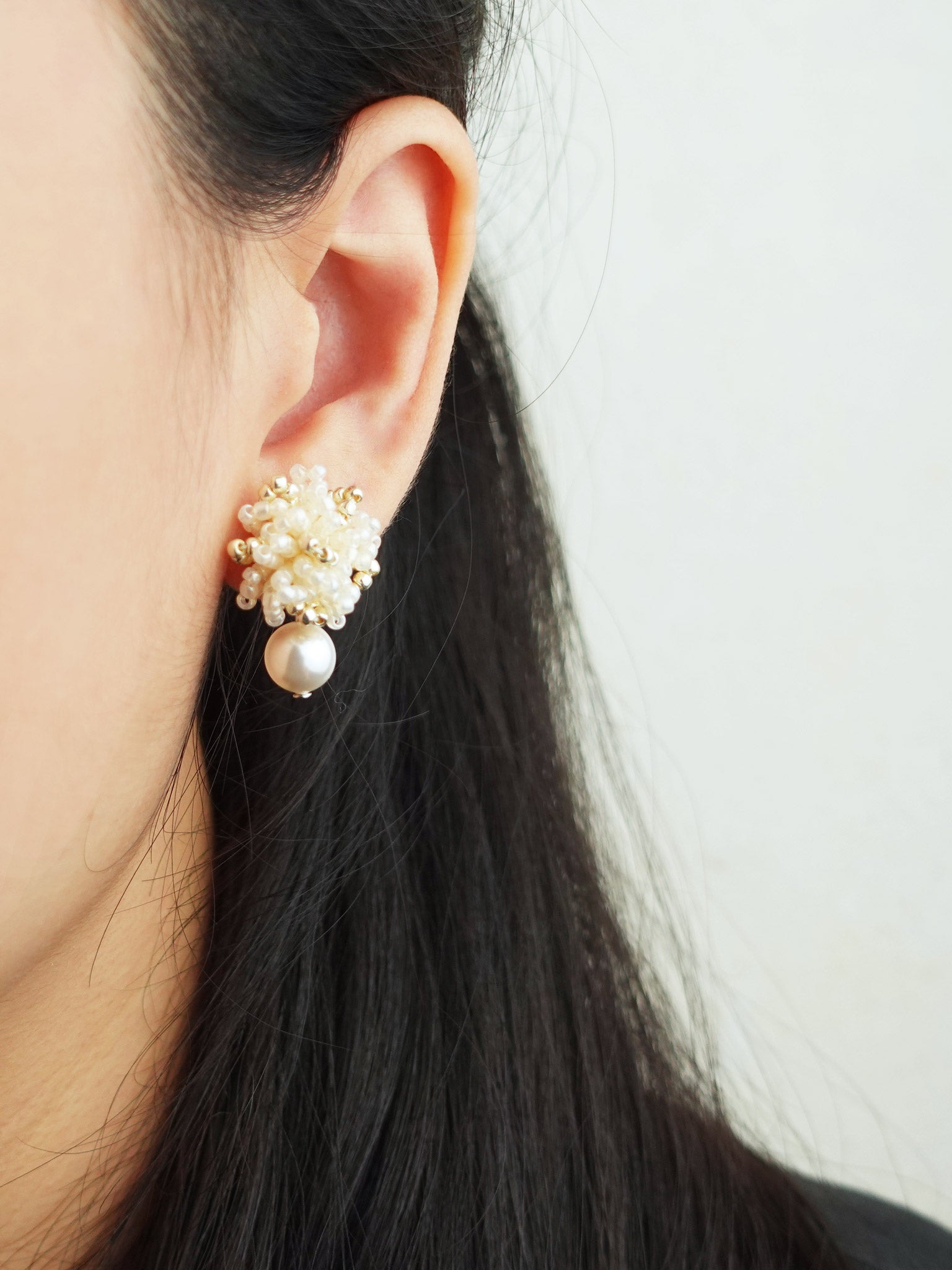Fluffy Mariota Earrings in Ivory Model