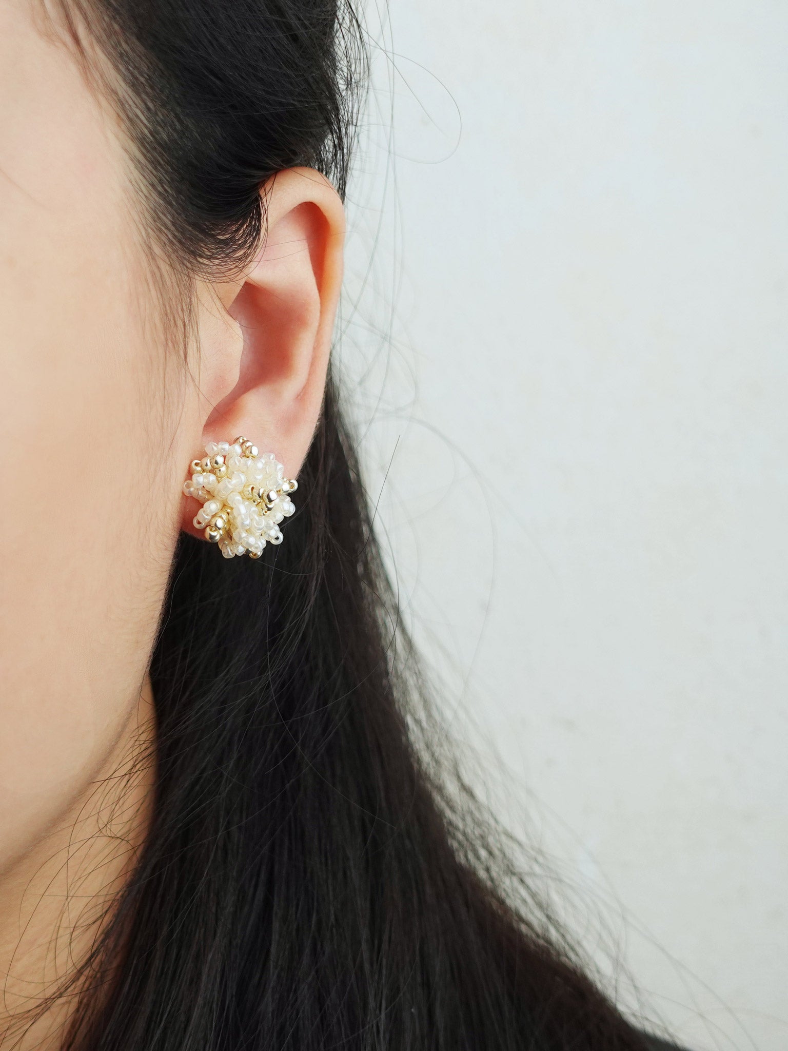 Fluffy Star Dust Earrings in Ivory Model