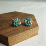Fluffy Star Dust Earrings in Ocean Green Display Front