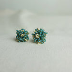 Fluffy Star Dust Earrings in Ocean Green Front