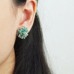 Fluffy Star Dust Earrings in Ocean Green Model