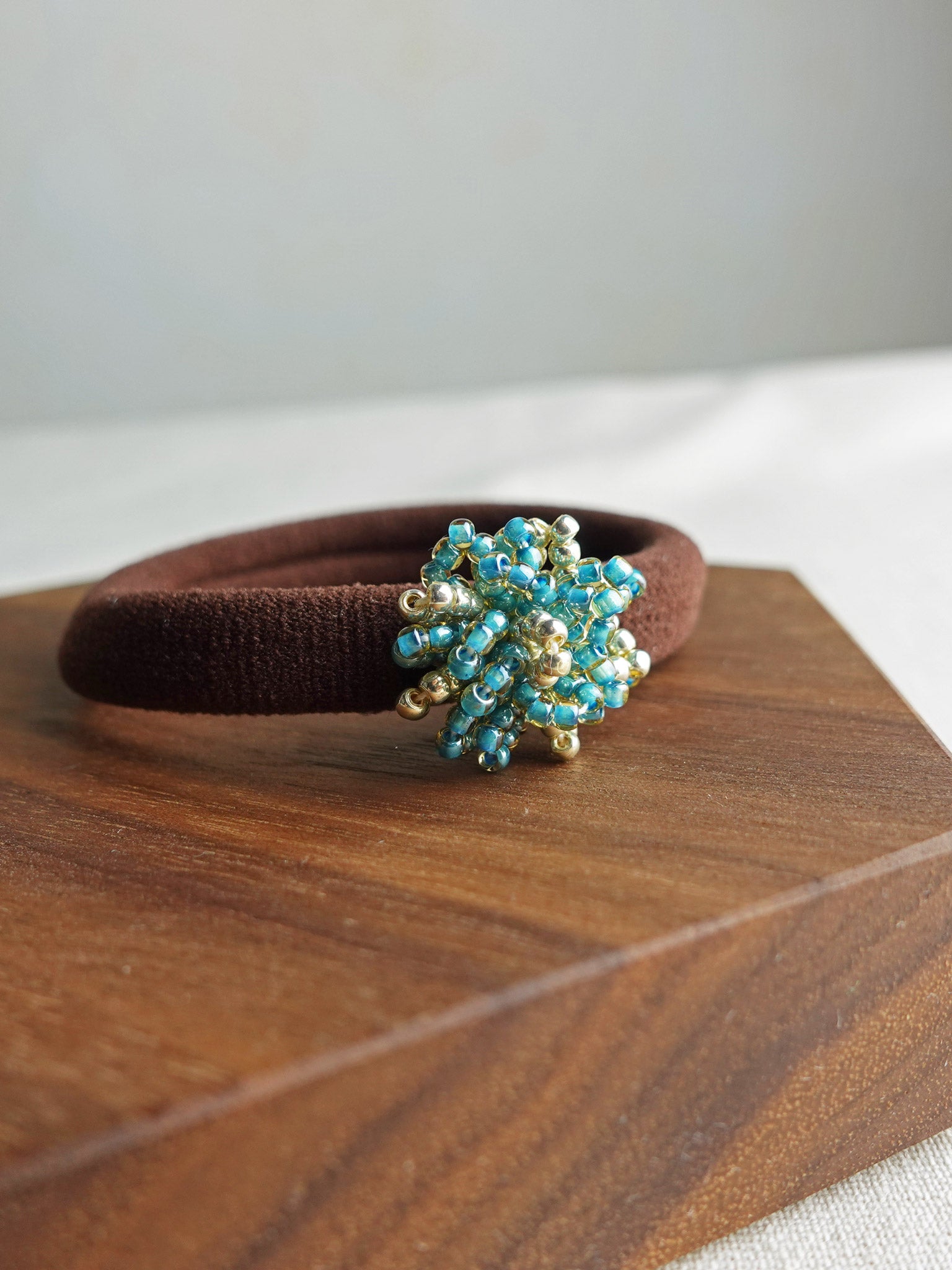 Fluffy Star Dust Hair Tie in Ocean Green Display