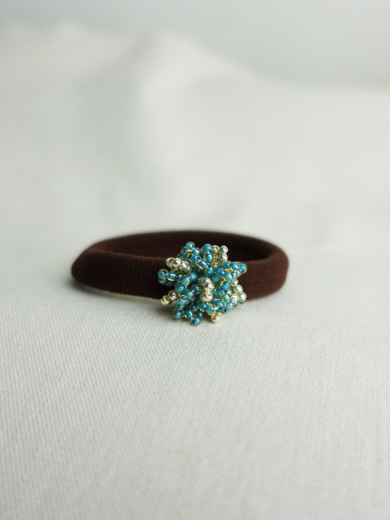 Fluffy Star Dust Hair Tie in Ocean Green Front