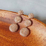 Juno Dangle Earrings in Champagne Pink Display Front