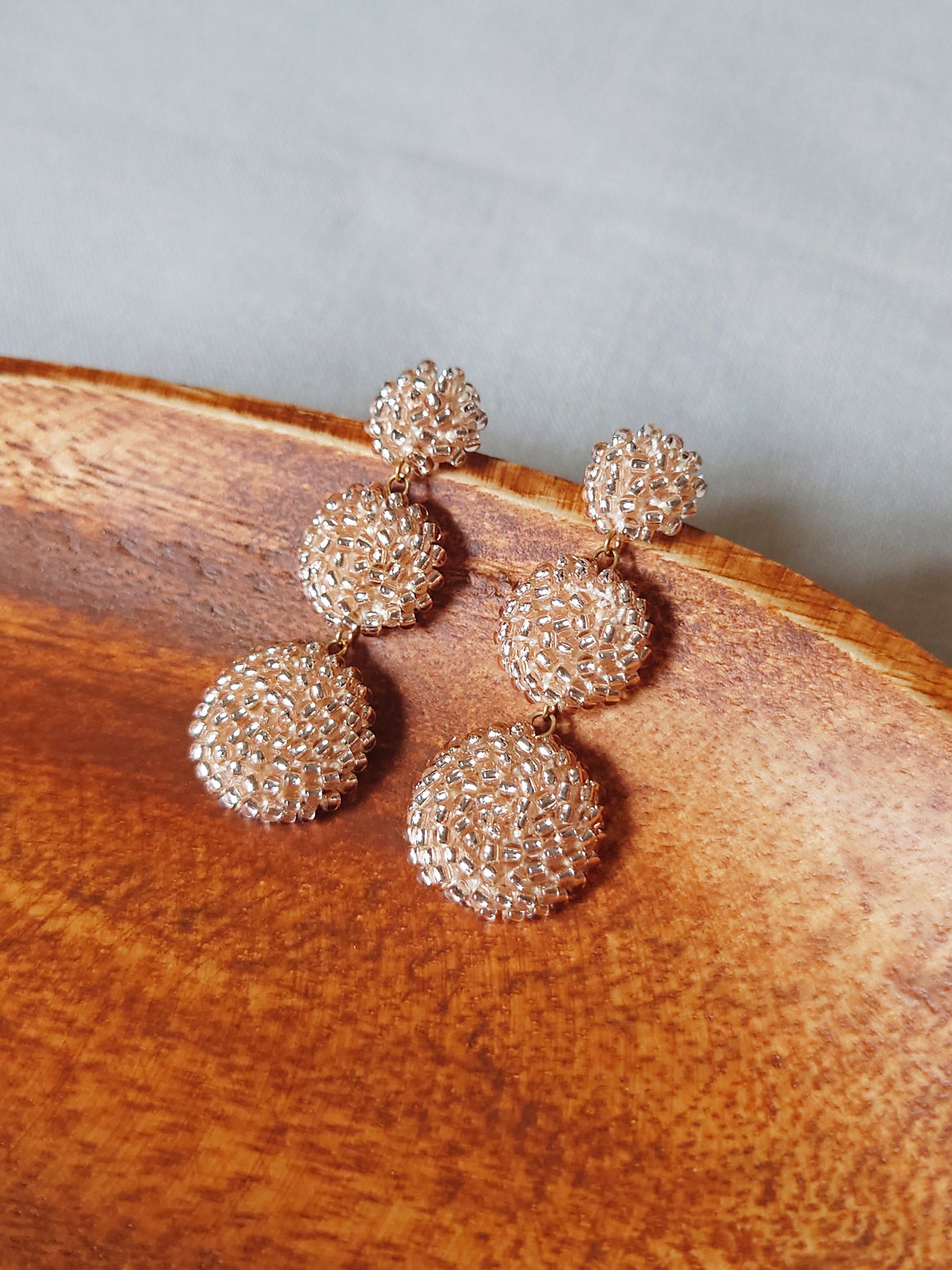 Juno Dangle Earrings in Champagne Pink Display Front