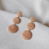 Juno Dangle Earrings in Champagne Pink Front