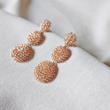 Juno Dangle Earrings in Champagne Pink Side