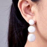 Juno Dangle Earrings in White Model