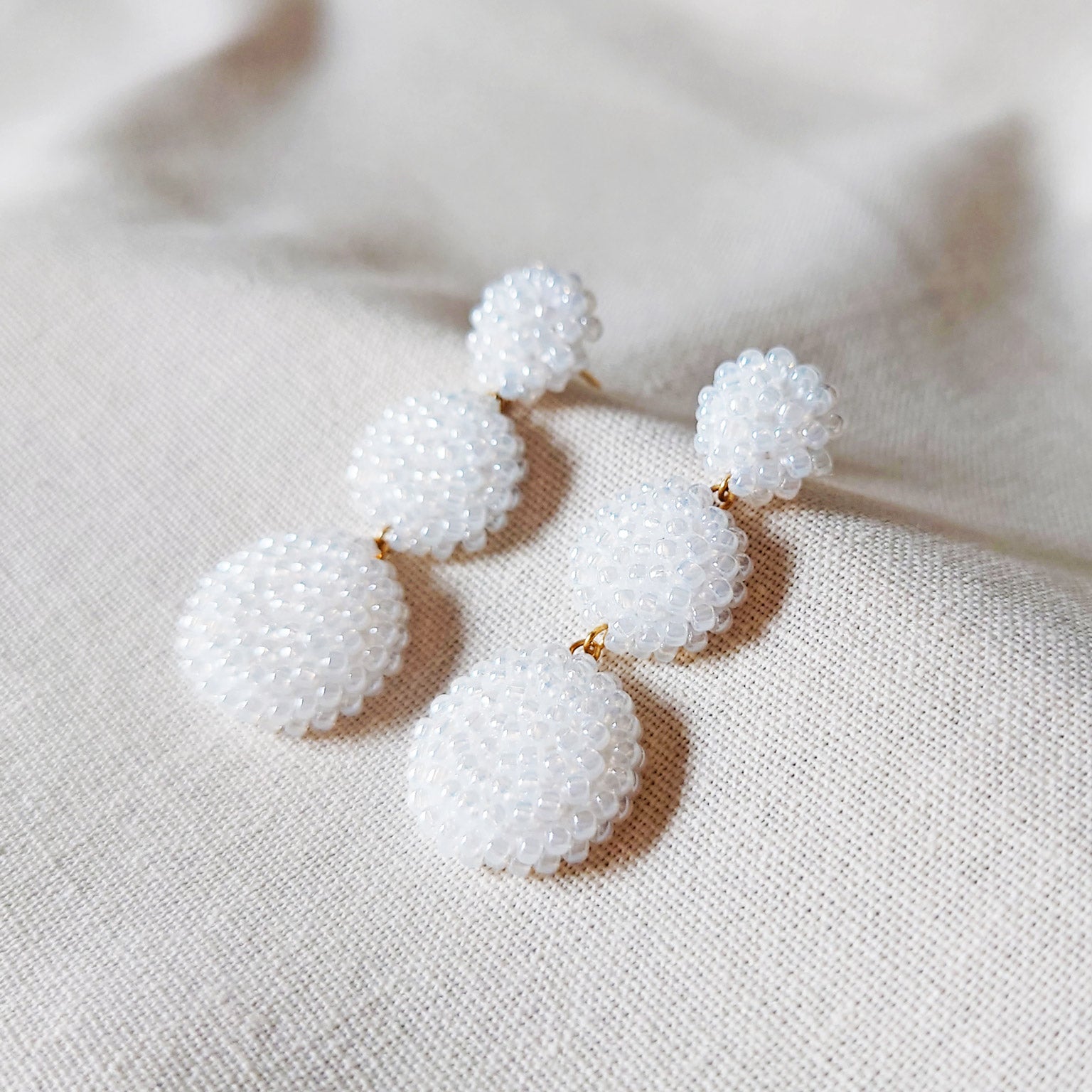 Juno Dangle Earrings in White Side