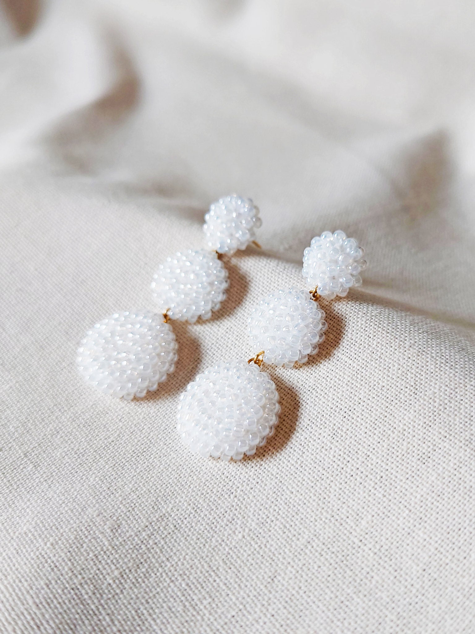Juno Dangle Earrings in White Side