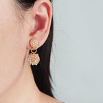 Larissa Drop Earrings in Champagne Pink Model