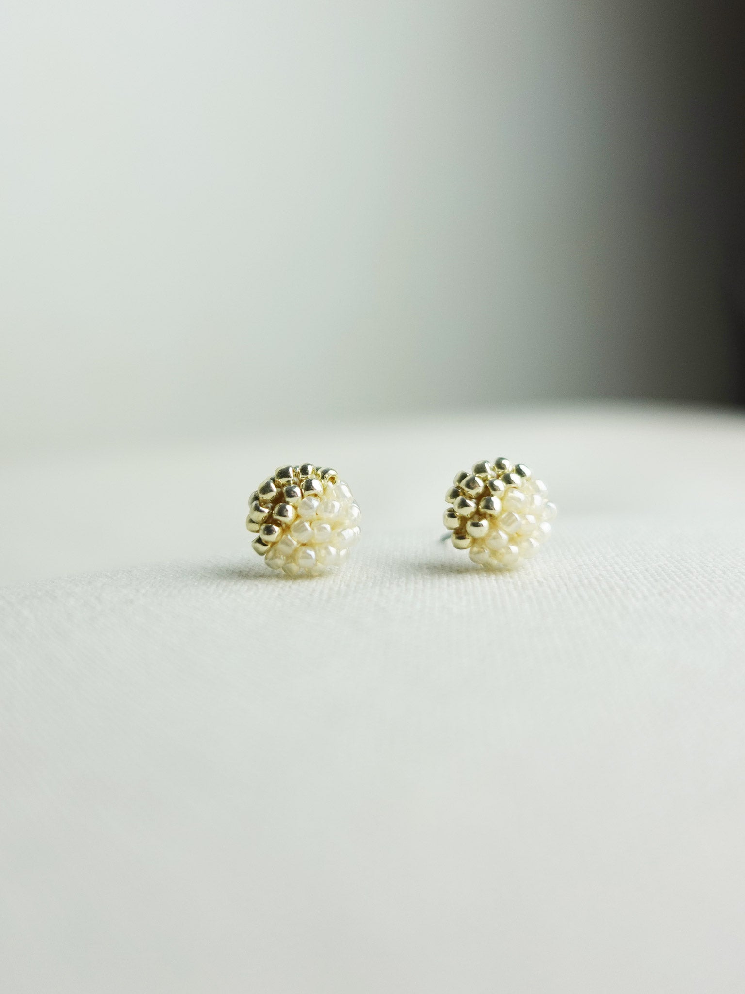 Last Quarter Petite Studs in Ivory Front 2
