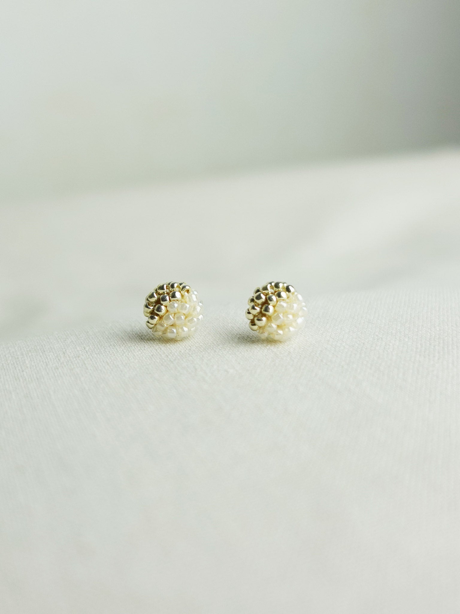 Last Quarter Petite Studs in Ivory Front 3