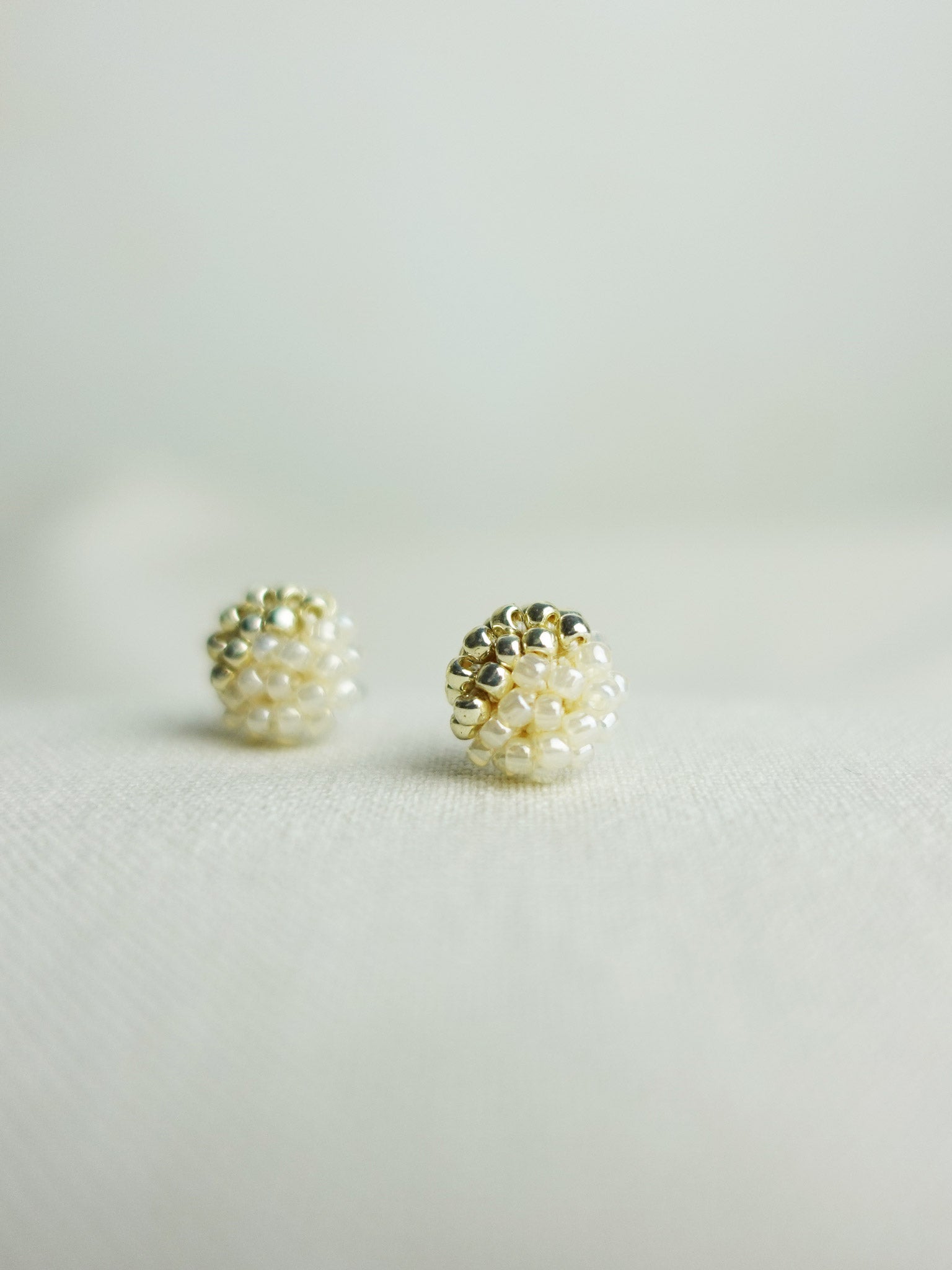 Last Quarter Petite Studs in Ivory Right