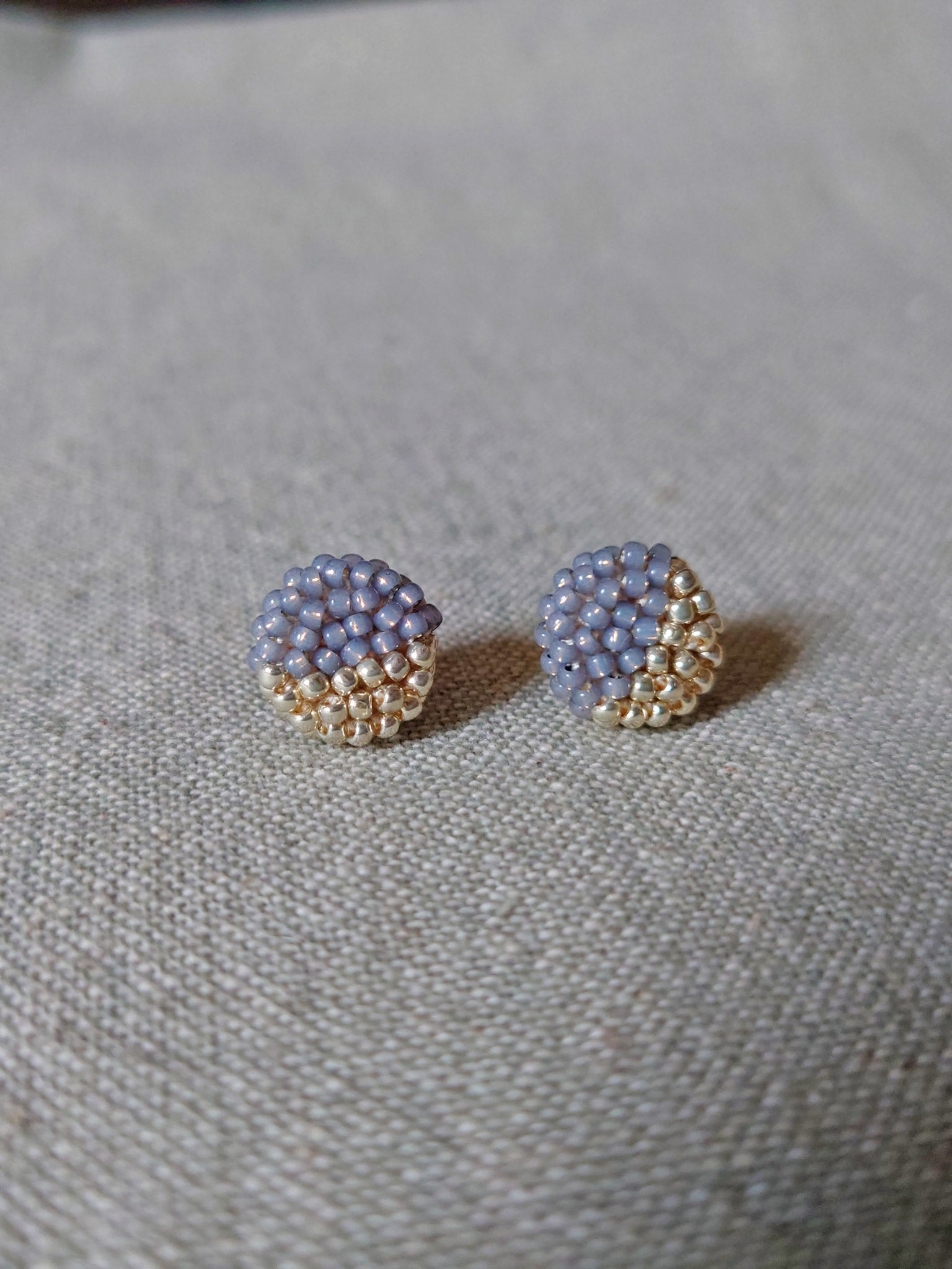 Last Quarter Delica Stud Earrings in Grey Front 1