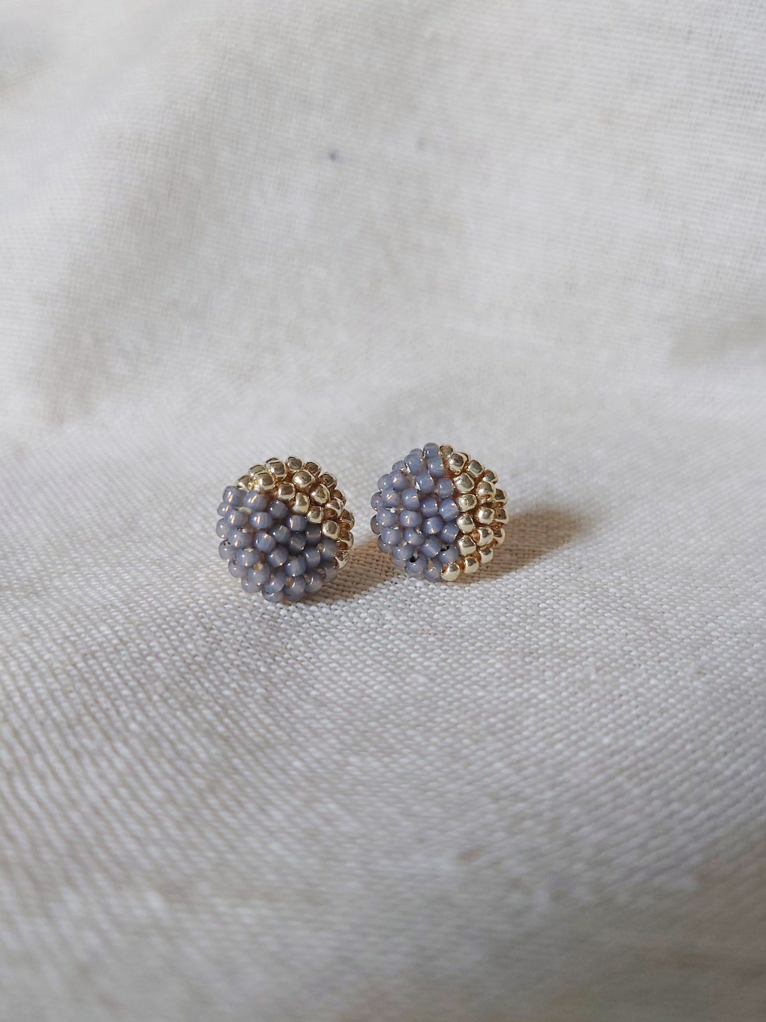 Last Quarter Delica Stud Earrings in Grey Front 2