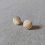 Last Quarter Delica Stud Earrings in Milk White Front