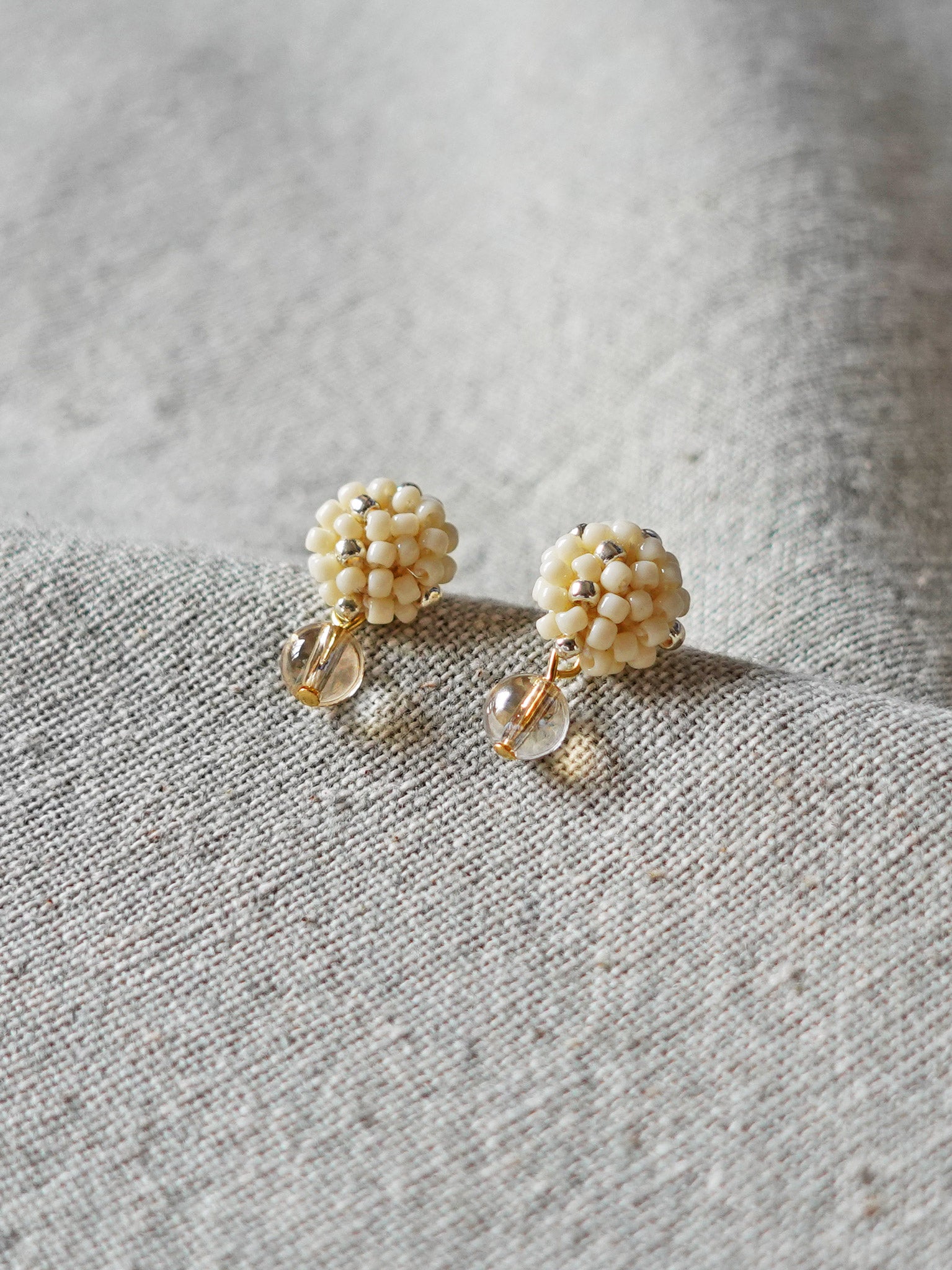 Layna Globe Earrings in Milk White Front