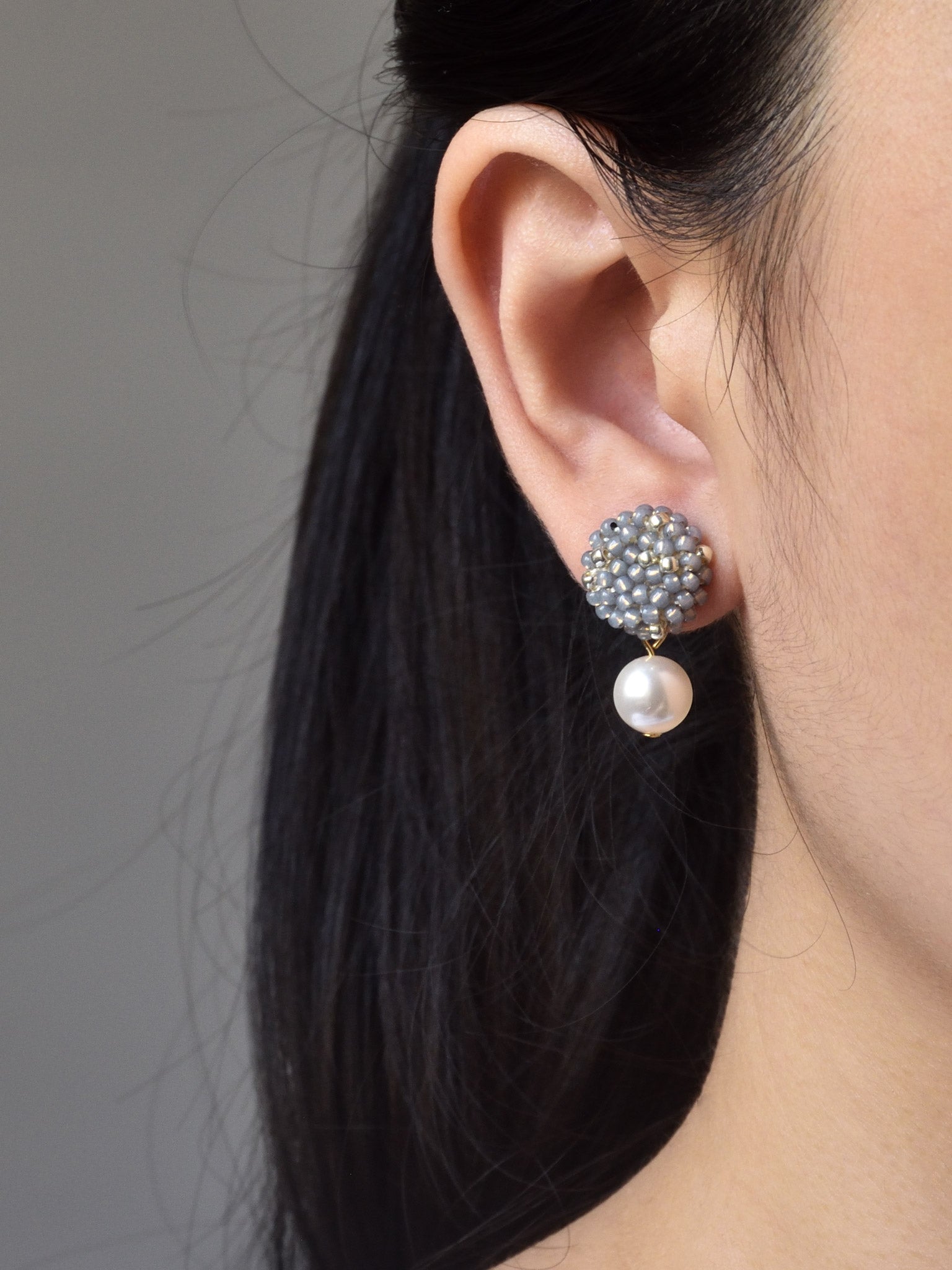 Mariota Drop Earrings in Grey Model
