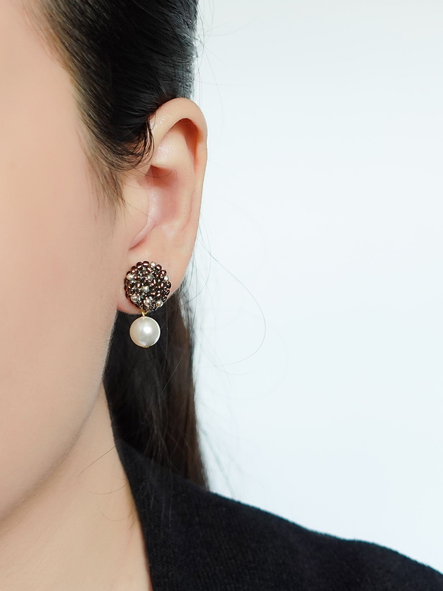 Mariota Drop Earrings in Umber Model