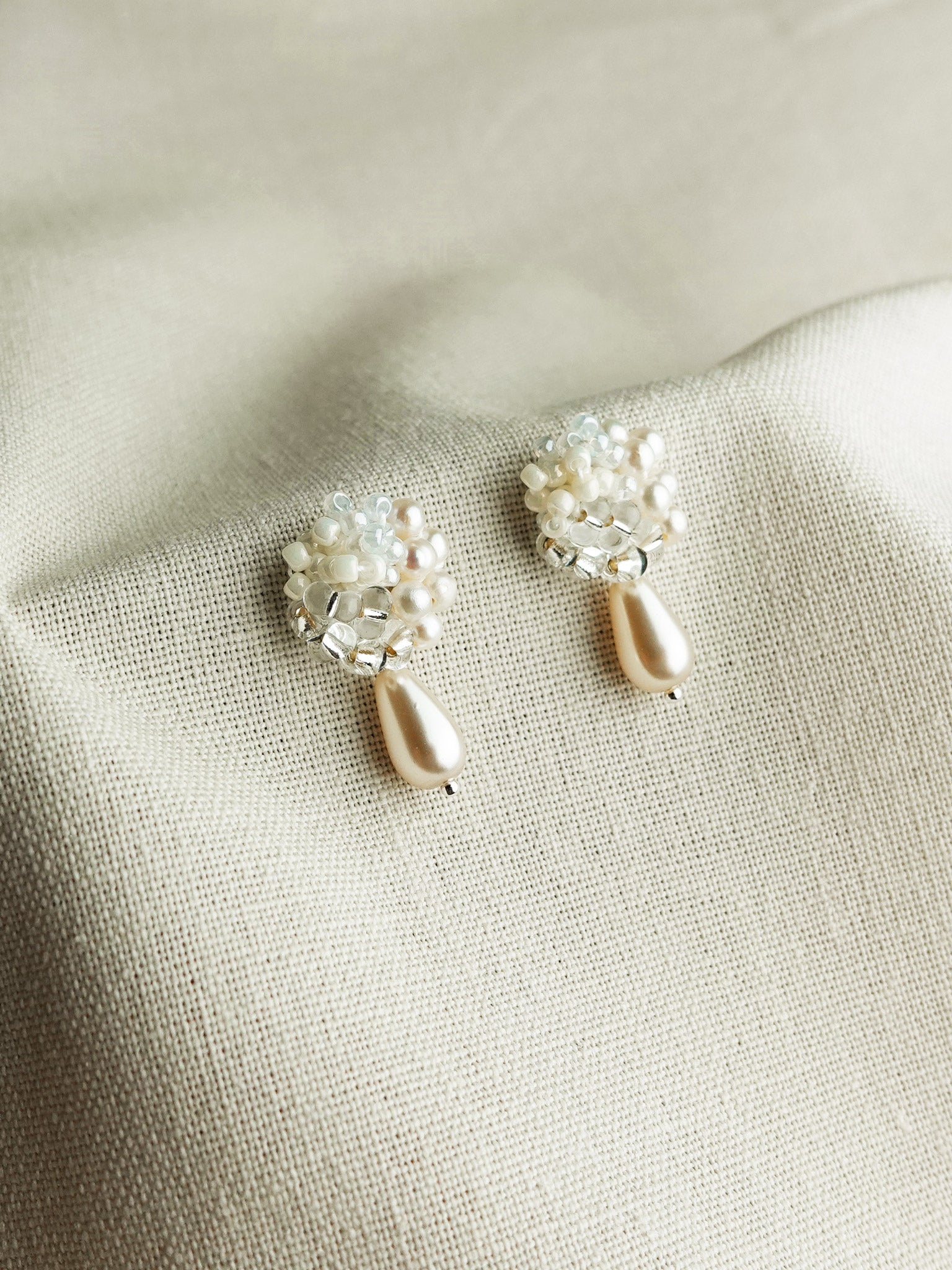 Marshmallow Ariel Teardrop Mariota Earrings Left