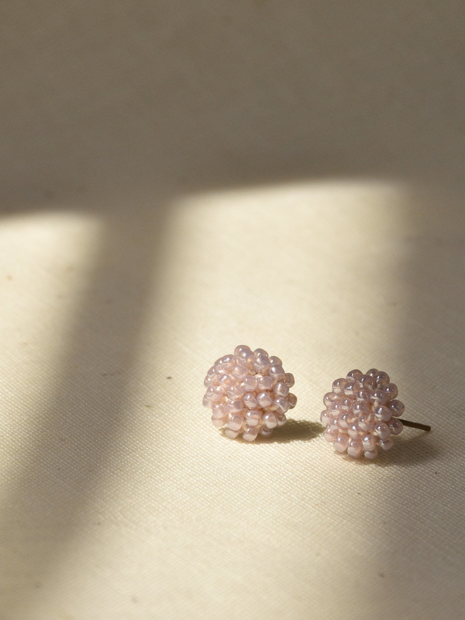 Prelude Petite Studs in Purple Left