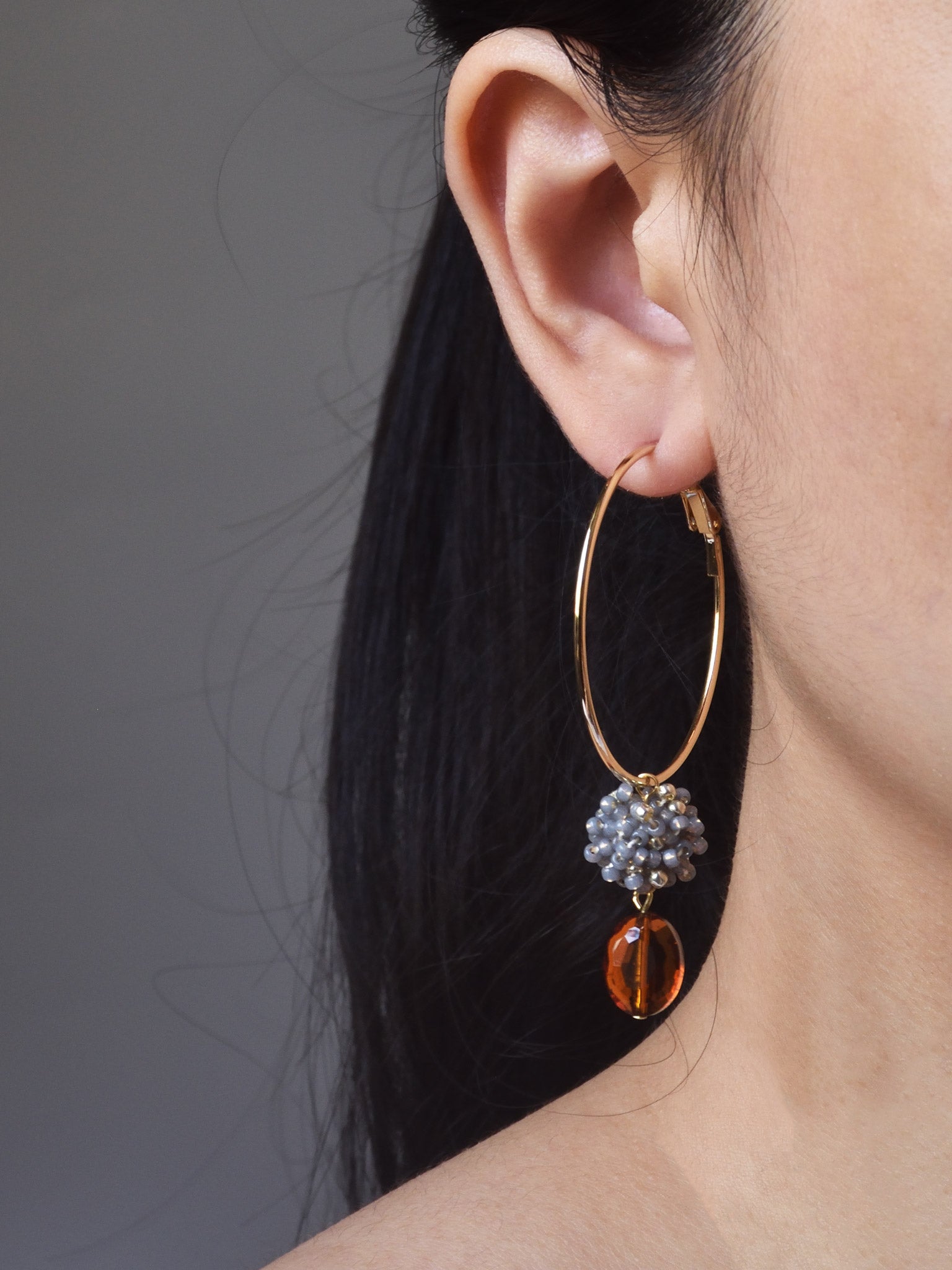 Penelope Ariel Hoop Earrings in Grey Model
