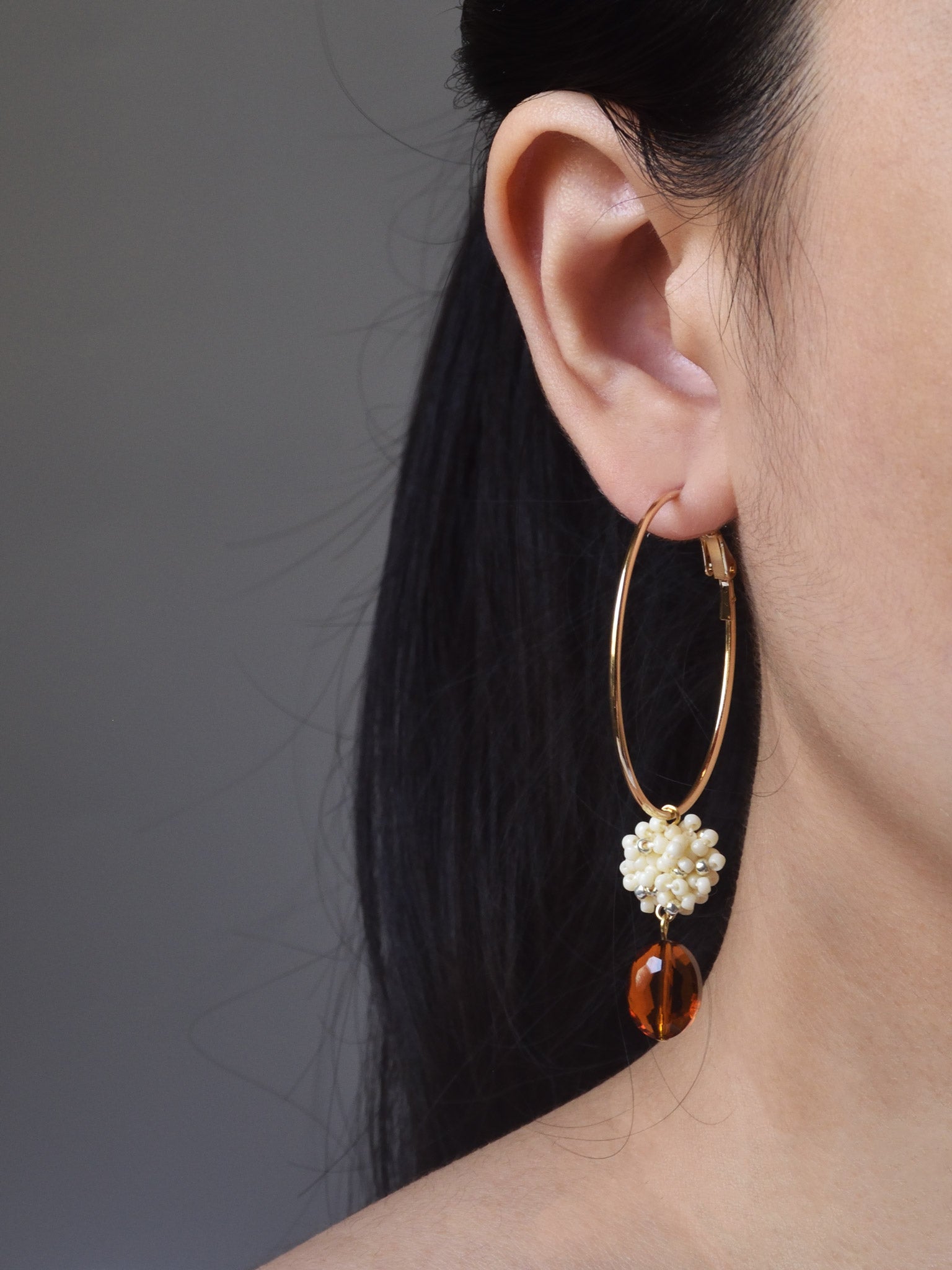 Penelope Ariel Hoop Earrings in Milk White Model