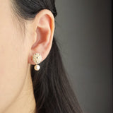 Phoebe Star Dust Earrings in Ivory Model