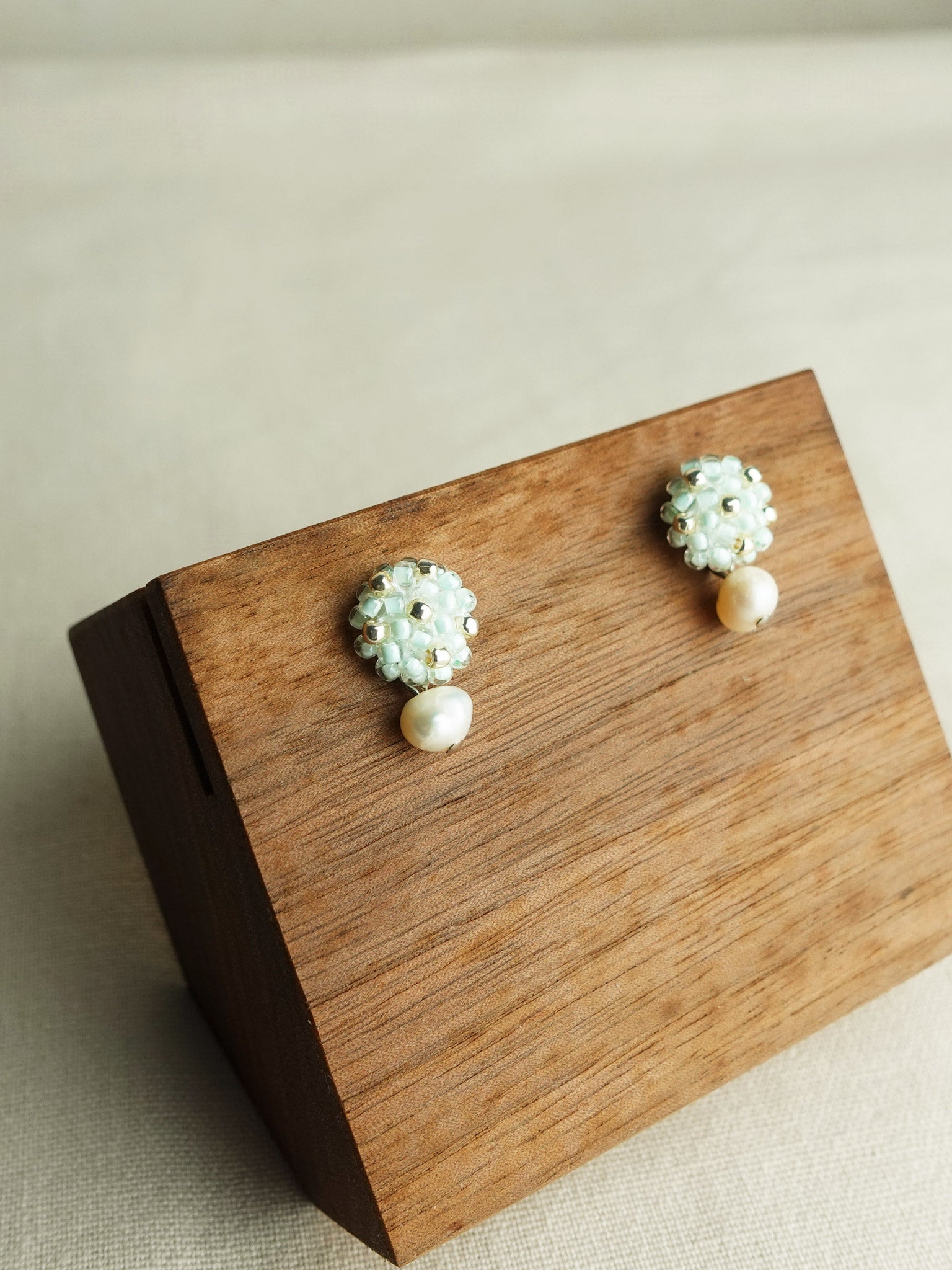Phoebe Star Dust Earrings in Mint Green Display