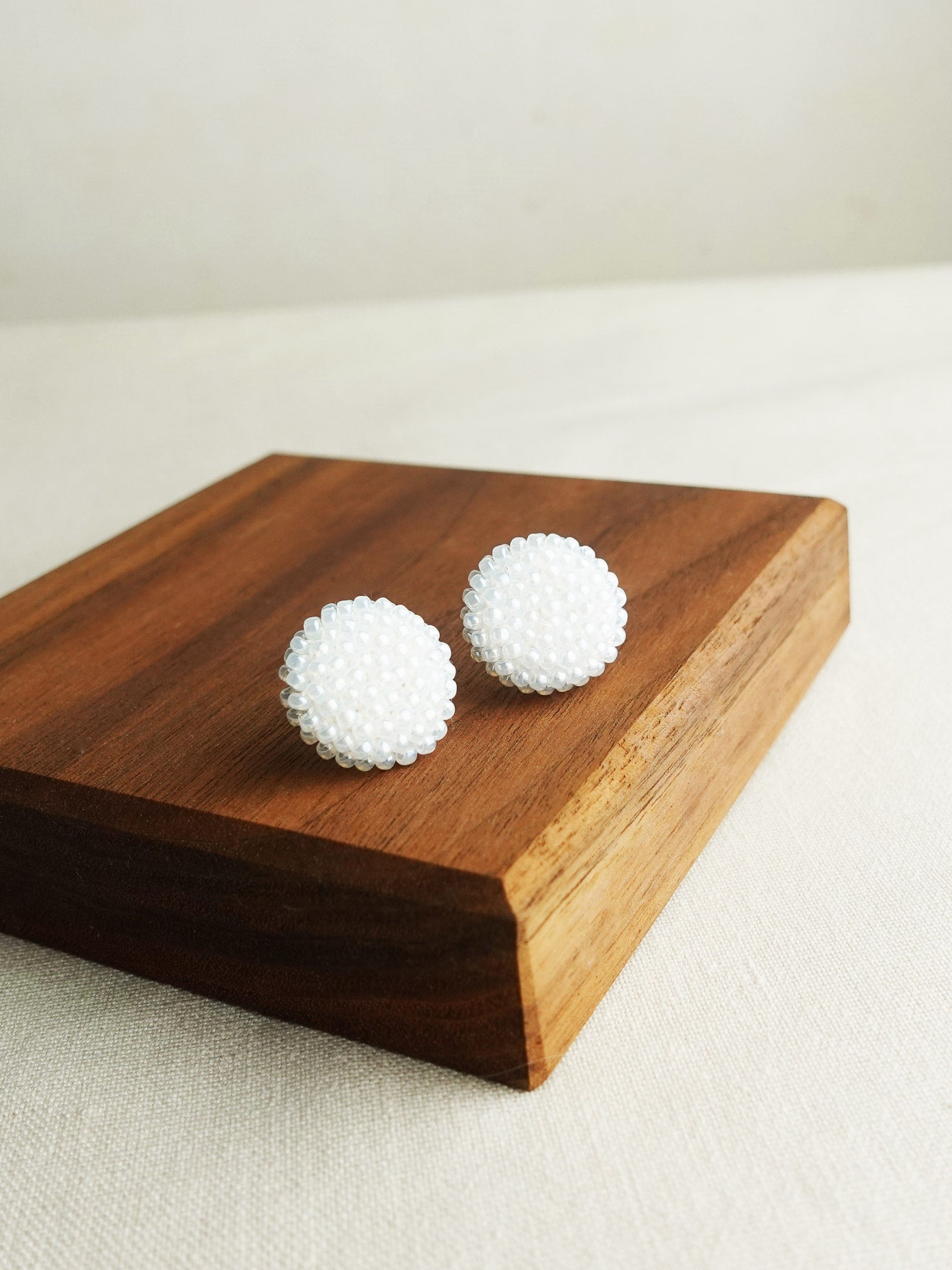 Prelude Maxi Stud Earrings in White Display