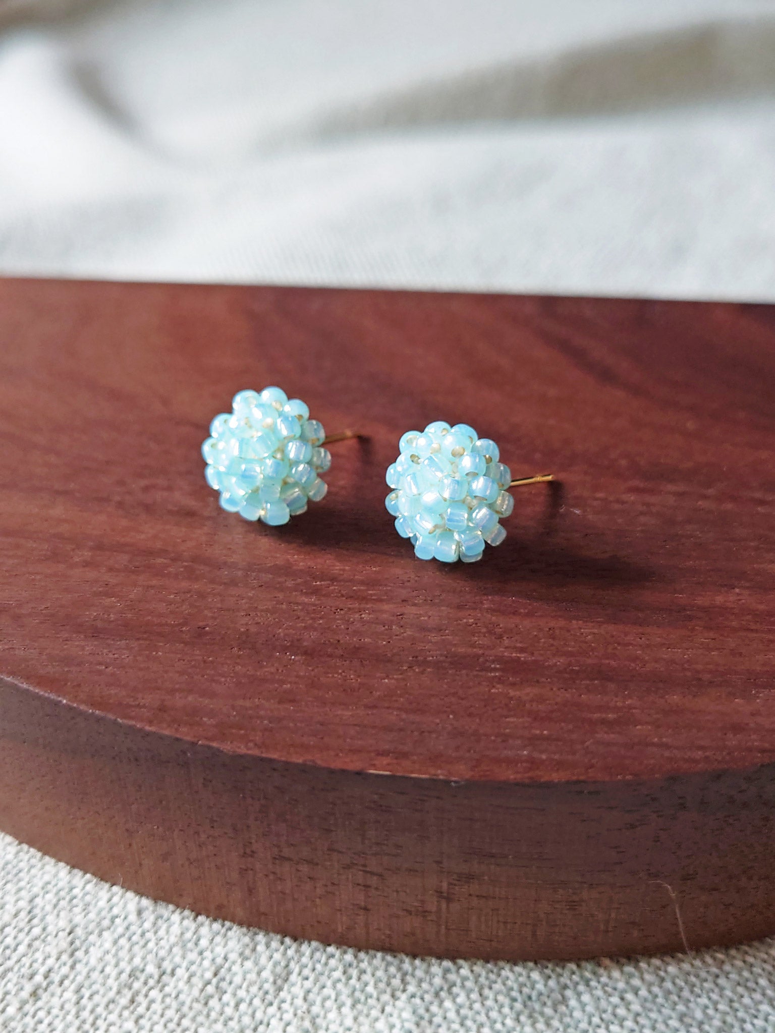 Prelude Petite Stud Earrings in Blue Display Front