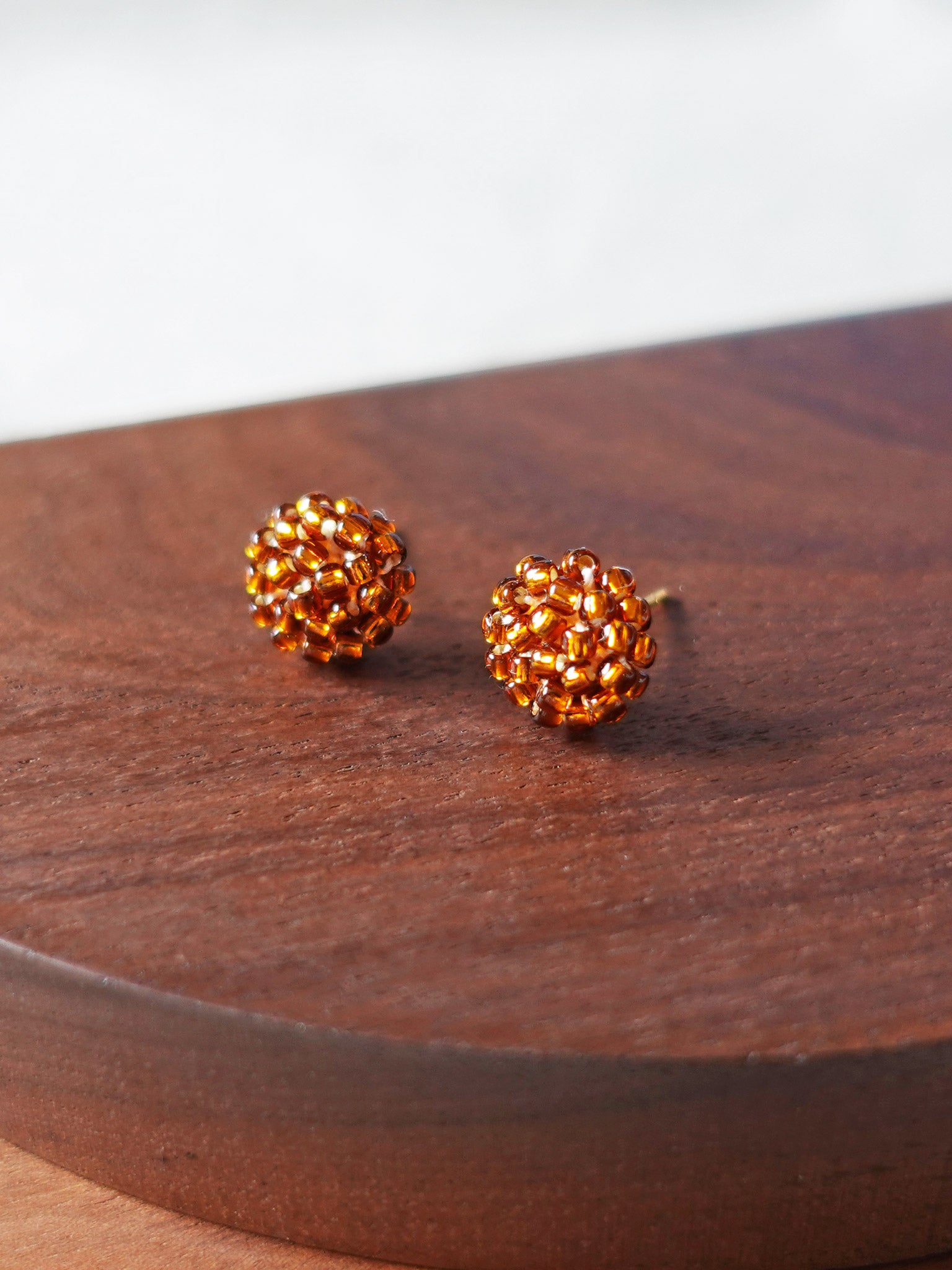 Prelude Petite Stud Earrings in Dark Amber Display Front