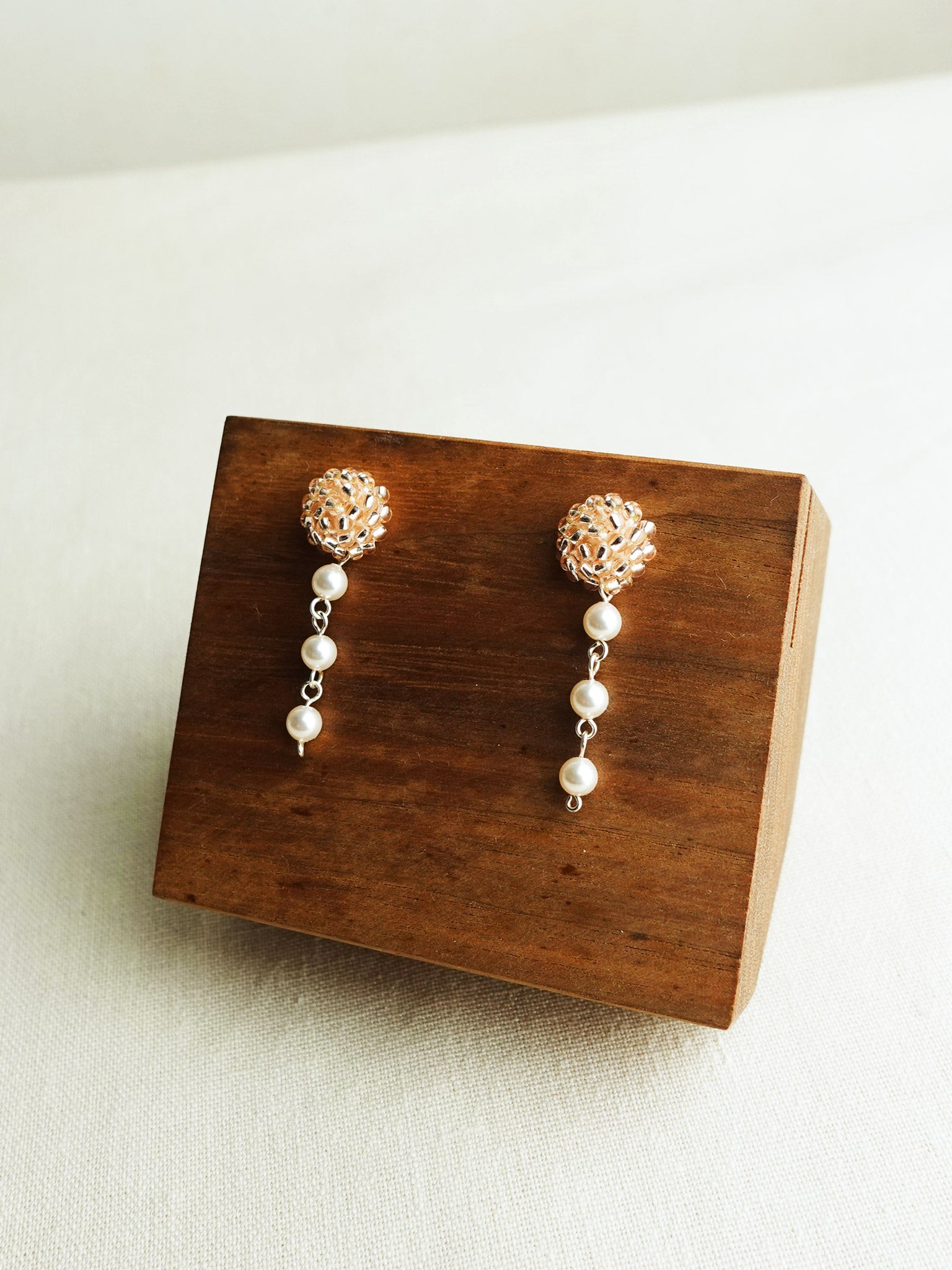 Raindrops on the Window Earrings in Champagne Pink Display Right