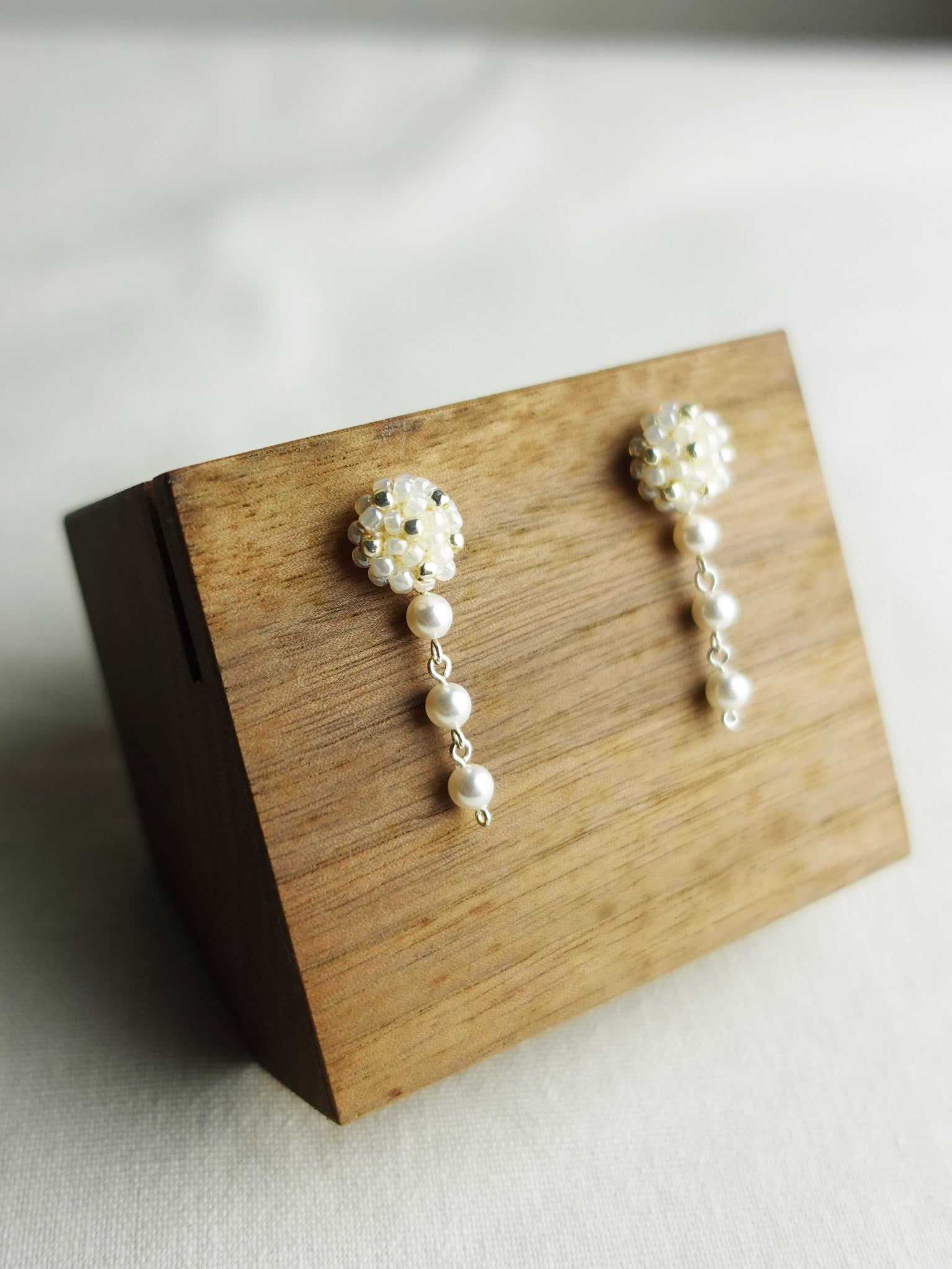 Raindrops on the Window Earrings in Ivory Display Left