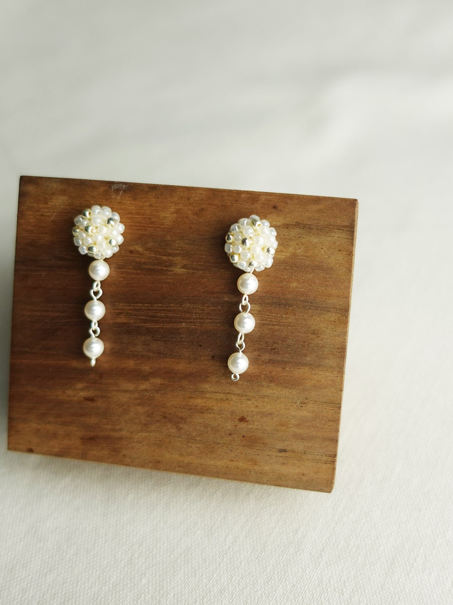 Raindrops on the Window Earrings in Ivory Display Right