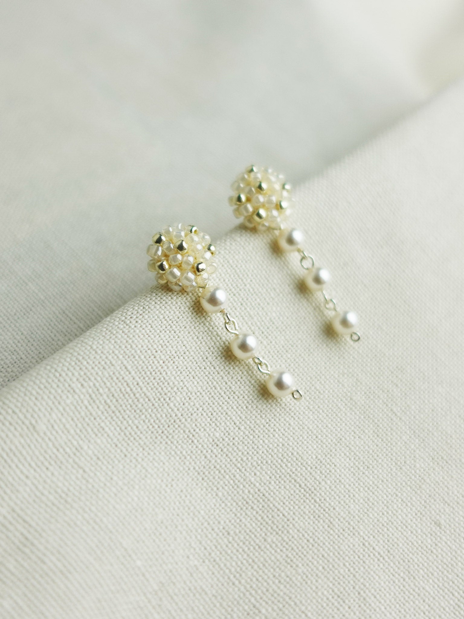 Raindrops on the Window Earrings in Ivory Left