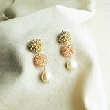 Richele Earrings in Champagne Pink Left