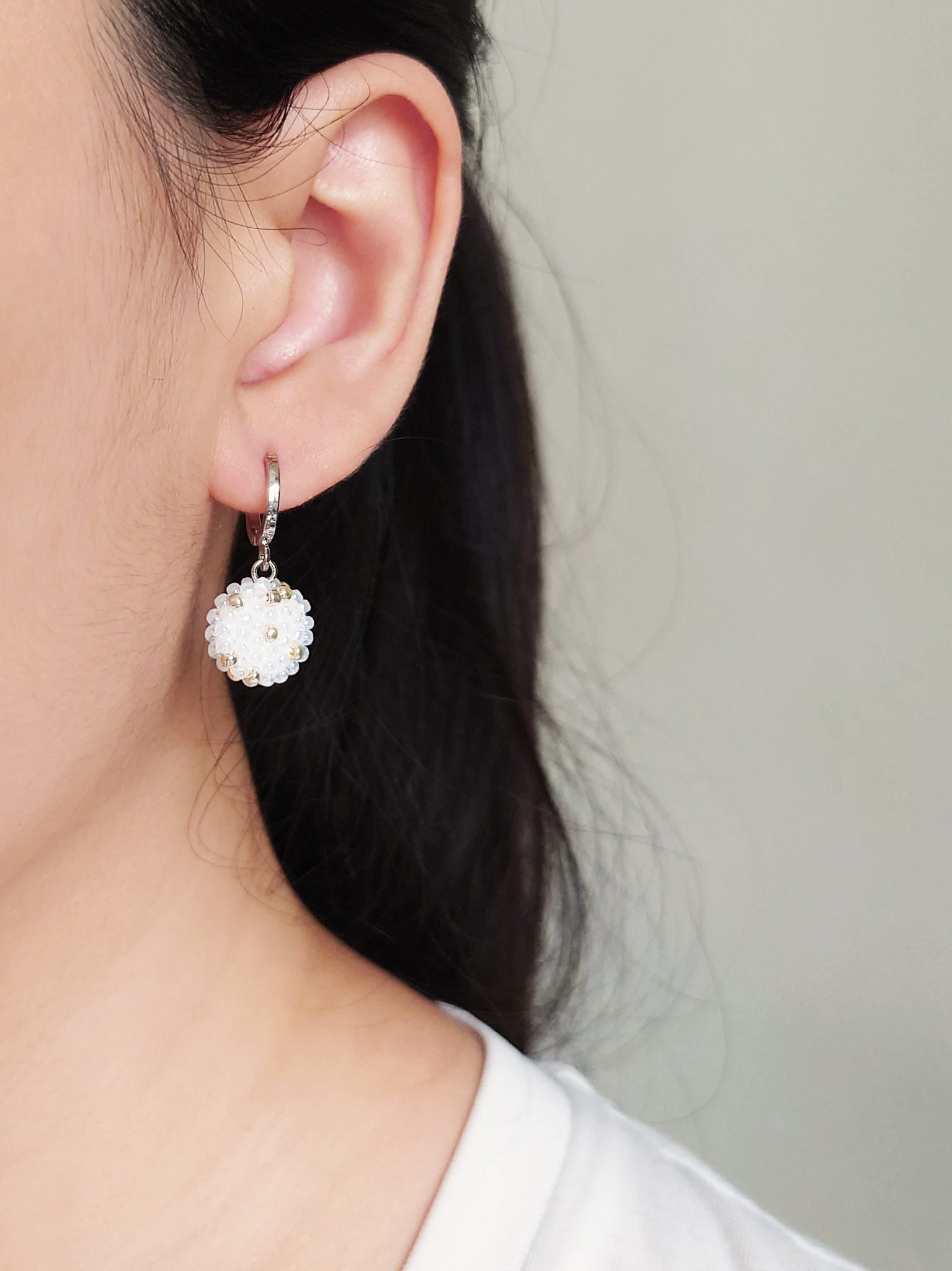 Star Dust Pendant Earrings in White Model