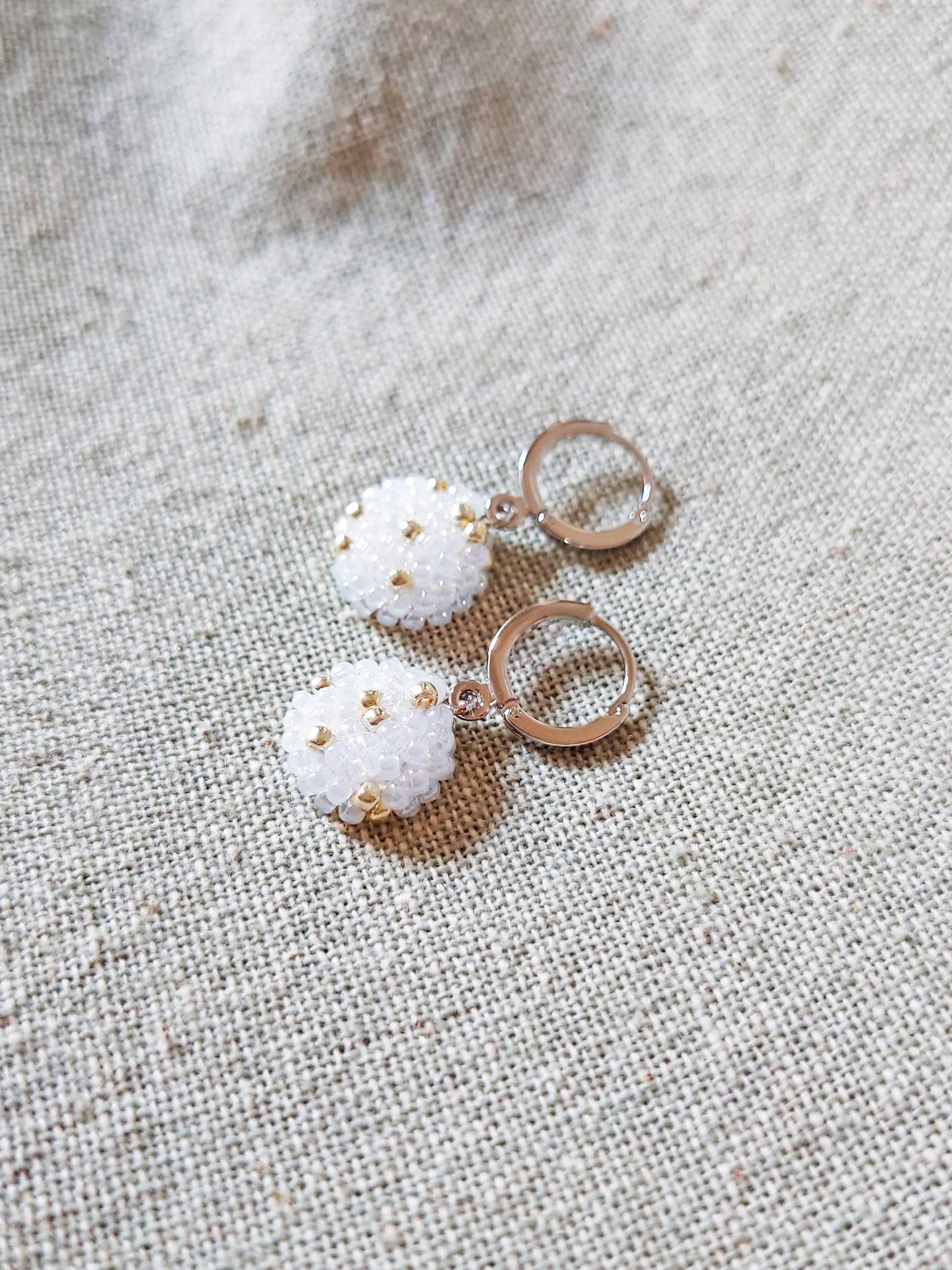 Star Dust Pendant Earrings in White Side