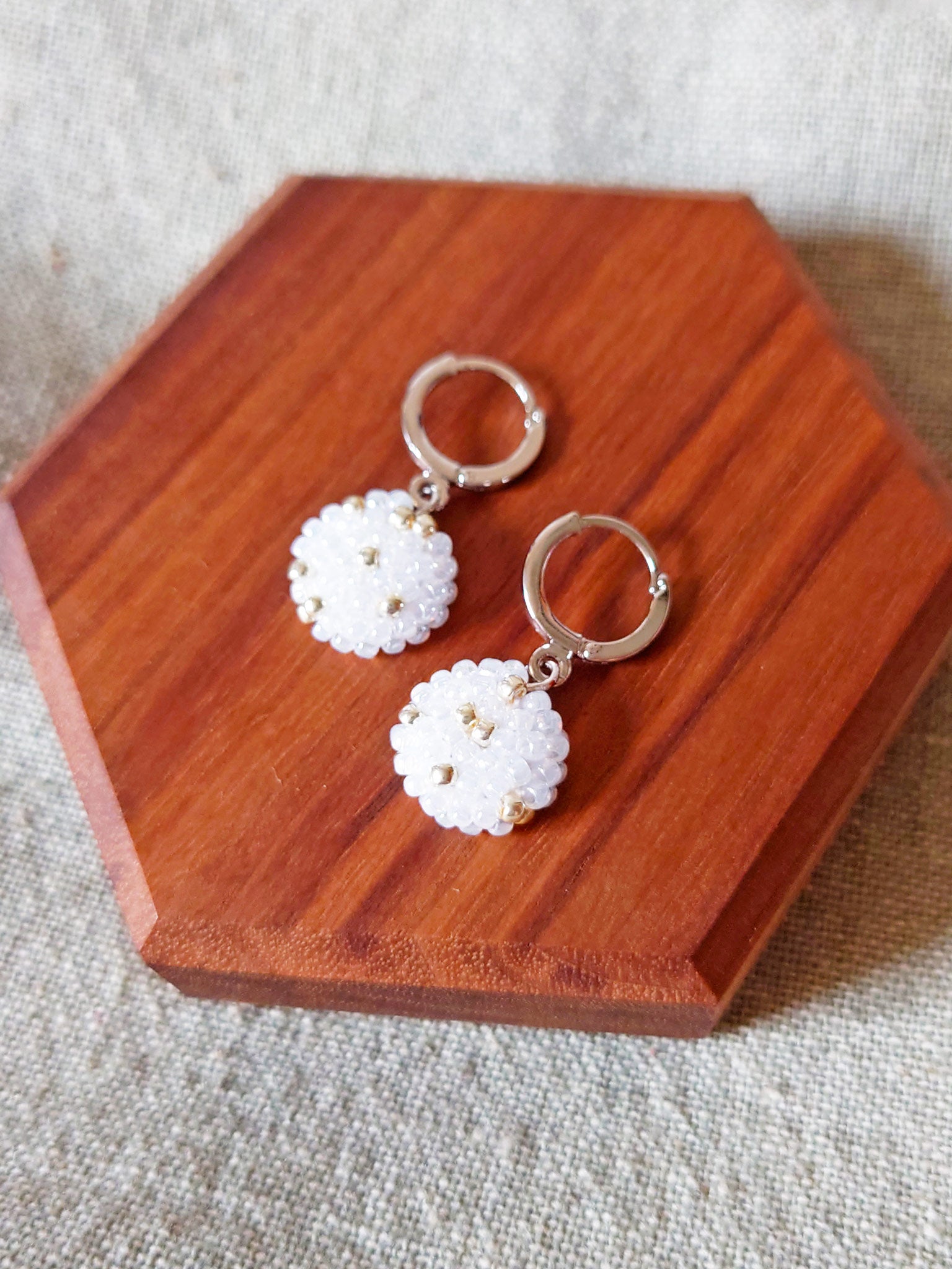 Star Dust Pendant Earrings in White Top Side