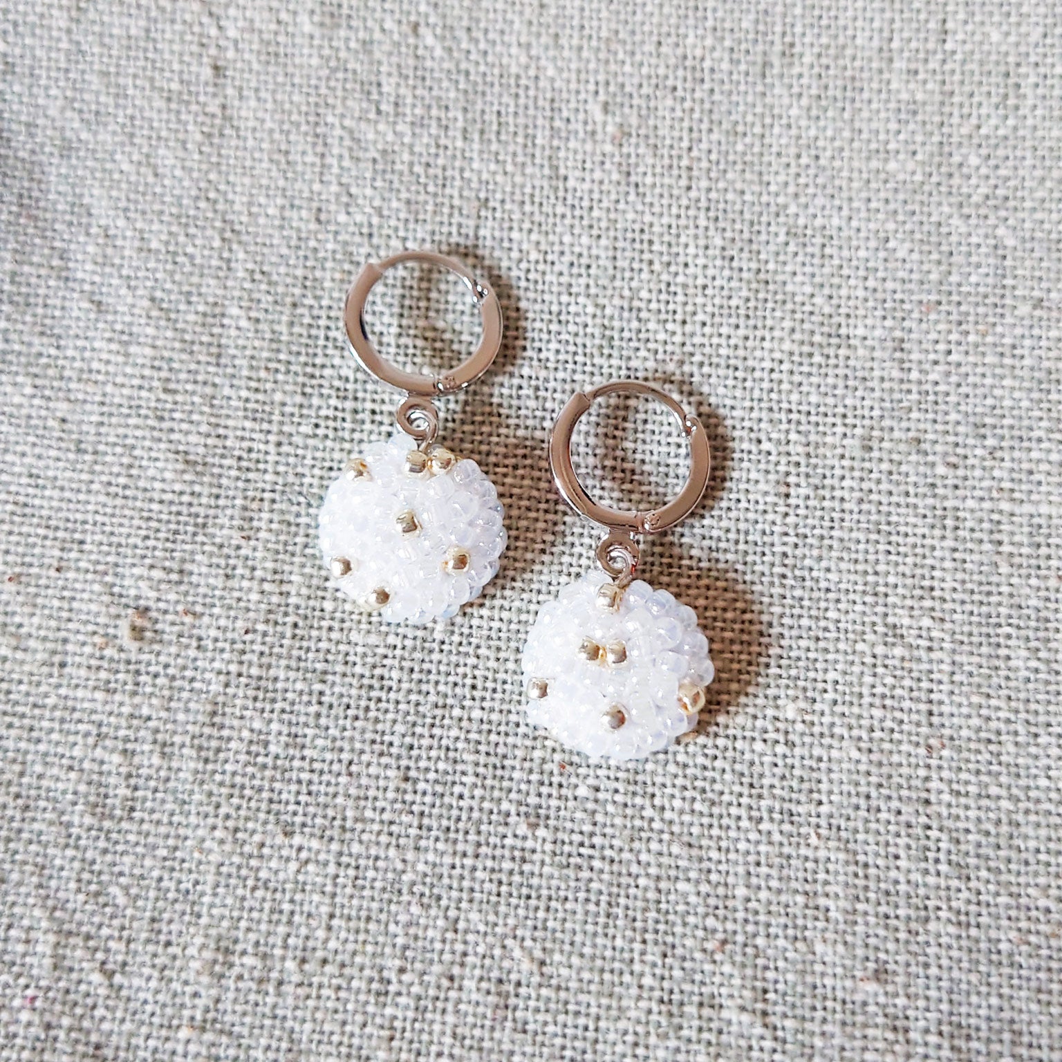 Star Dust Pendant Earrings in White Top