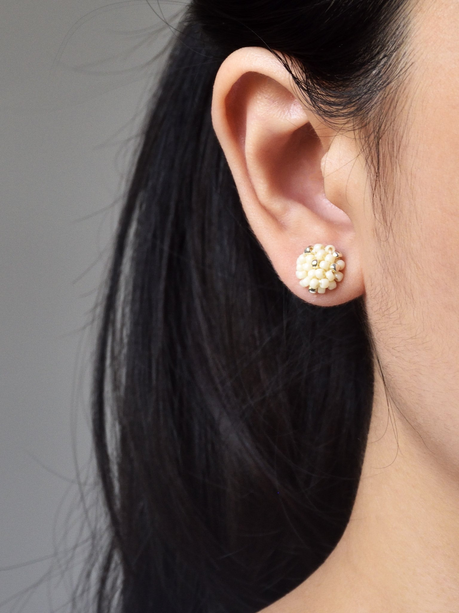 Star Dust Petite Earrings in Milk White Model