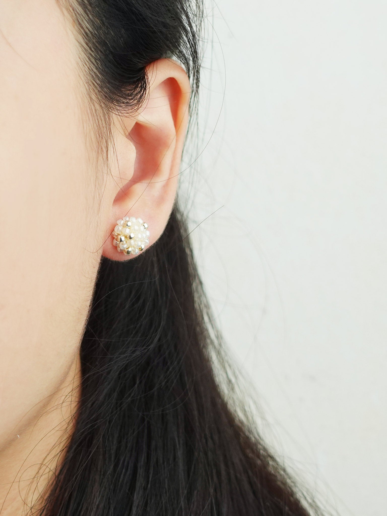 Star Dust Petite Stud Earrings in Ivory Model