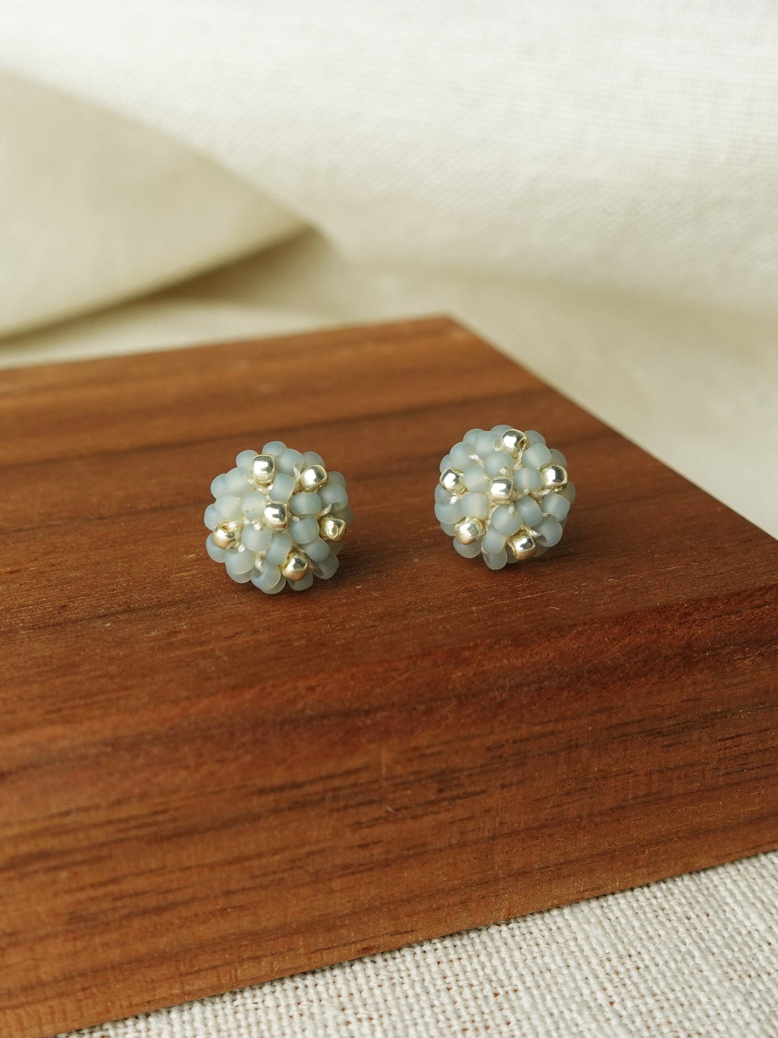 Star Dust Petite Stud Earrings in Smoke Grey Display